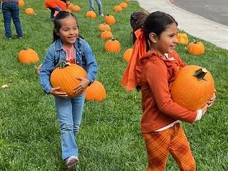 Student at Village school Pumpkin Patch
