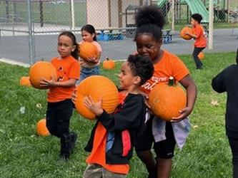 Student at Village school Pumpkin Patch