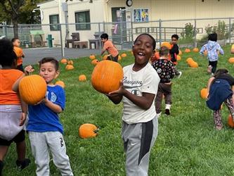 Student at Village school Pumpkin Patch