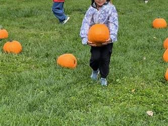 Student at Village school Pumpkin Patch